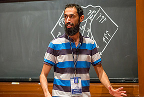 Ahmed Almheiri speaks on the stage at Wolfensohn Hall at the Institute for Advanced Study